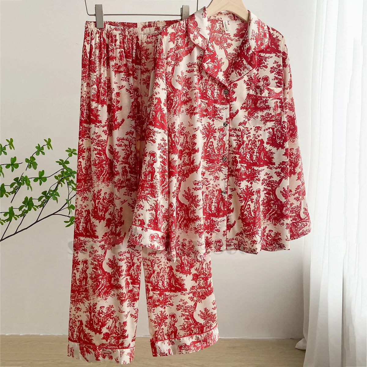 Conjunto de pijama de hojas rojas